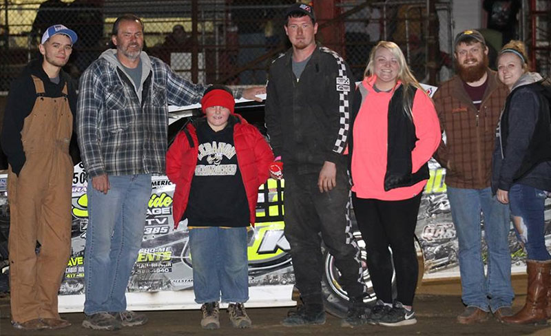 Tyler Knudtson celebrates with family and crew members  after winning the 2018 Bud Perry Memorial at the Lebanon Midway Speedway.