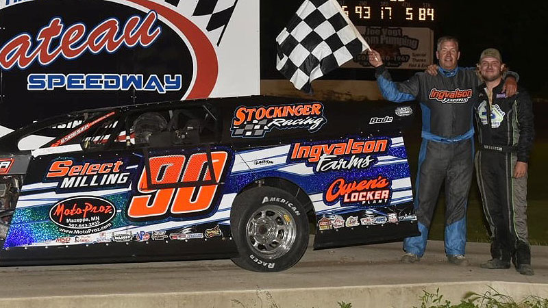 Steve Wetzstein poses with his son, Ryan, after winning the USRA Modified feature on Friday, June 14, at the Chateau Speedway in Lansing, Minn.