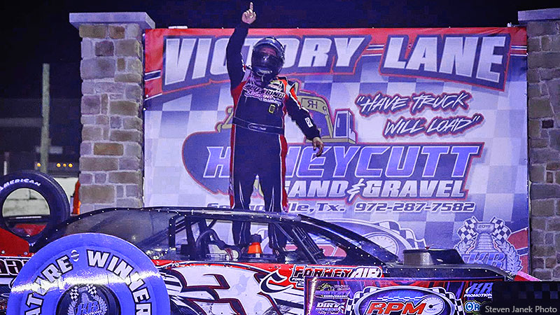 Charlie Smith celebrates in victory lane after winning the USRA Modified feature.