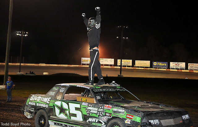 Brett Heeter celebrates after winning the Holley USRA Stock Car feature.