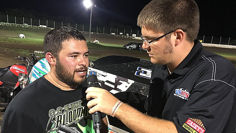 Bryce Hall interviews USMTS driver Johnny Scott at the King of America VII in Humboldt, Kan.