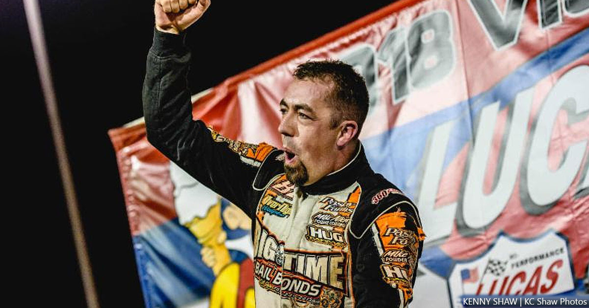 Darron Fuqua celebrates his first Lucas Oil Speedway feature win after a last-turn pass gave him the USRA Modified feature Saturday night.