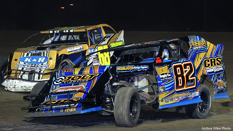 David Wood (82) and Dean Wille (68) compete in USRA Modified action at Central Missouri Speedway.