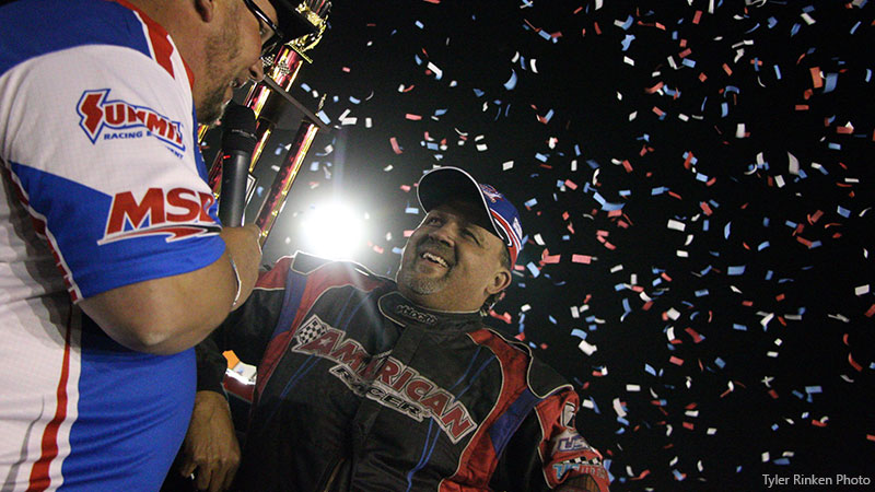 Todd Staley celebrates after winning the American Racer USRA Stock Car feature during the Rumble By River at the Hamilton County Speedway.