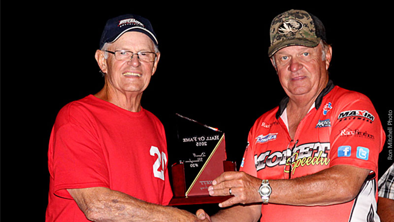Randy Mooneyham (right) inducting his brother, Darrell, into Monett Speedway's Hall of Fame in 2015.