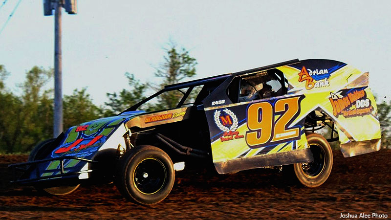 Danny Scrogham of Peculiar, Mo., takes to the high side of Central Missouri Speedway in his USRA Modified.