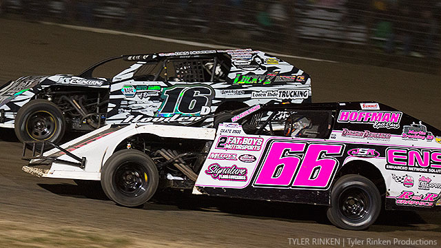 The top two drivers in Out-Pace USRA B-Mod national points--Ryan Gillmore (66) and Dan Hovden (16)--battle for position during their main event Friday at the Summit USRA Nationals.