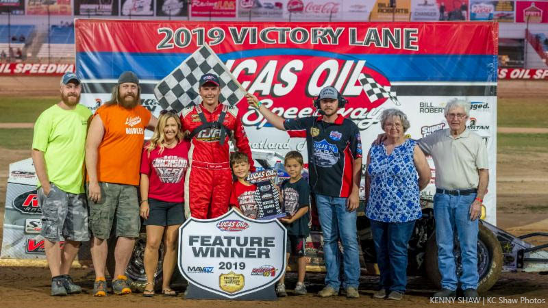 Kris Jackson and team, along with Jim and Sally Ruble (far right), after his latest win at the Lucas Oil Speedway on Saturday, July 20.