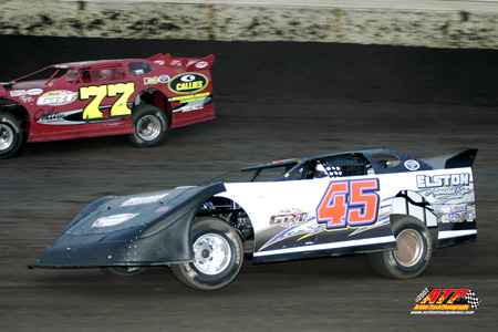 Main event winner Tommy Elston (45) battles with Jeff Aikey dring heat race action.